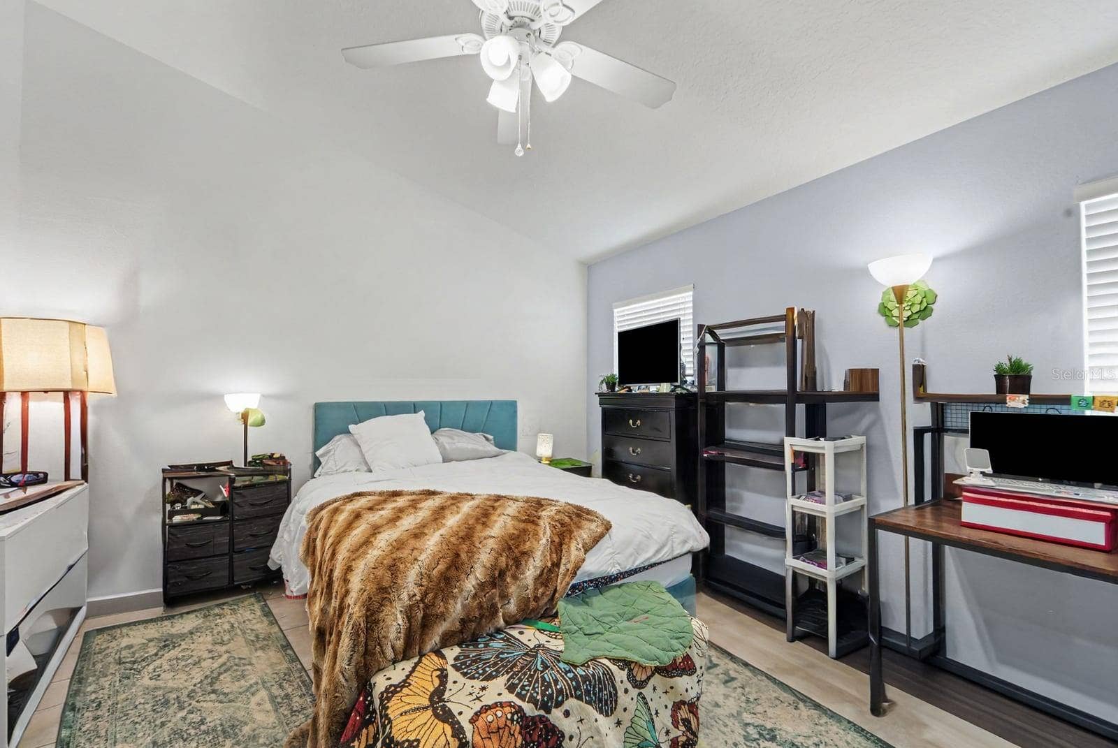 10913 BUCKWATER COURT, Orlando, FL 32817 Master Bedroom with Botanical Artwork, Window Light & Comfortable Layout