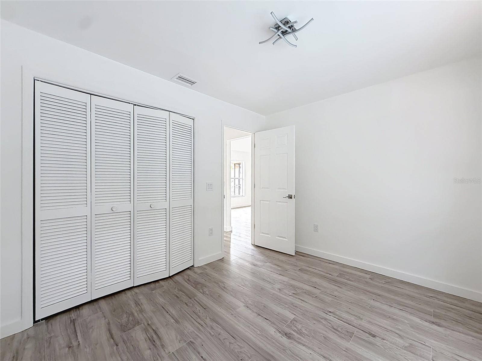 11 CARNATION COURT E, Homosassa, FL 34446 Generous closet space keeps your bedroom organized.