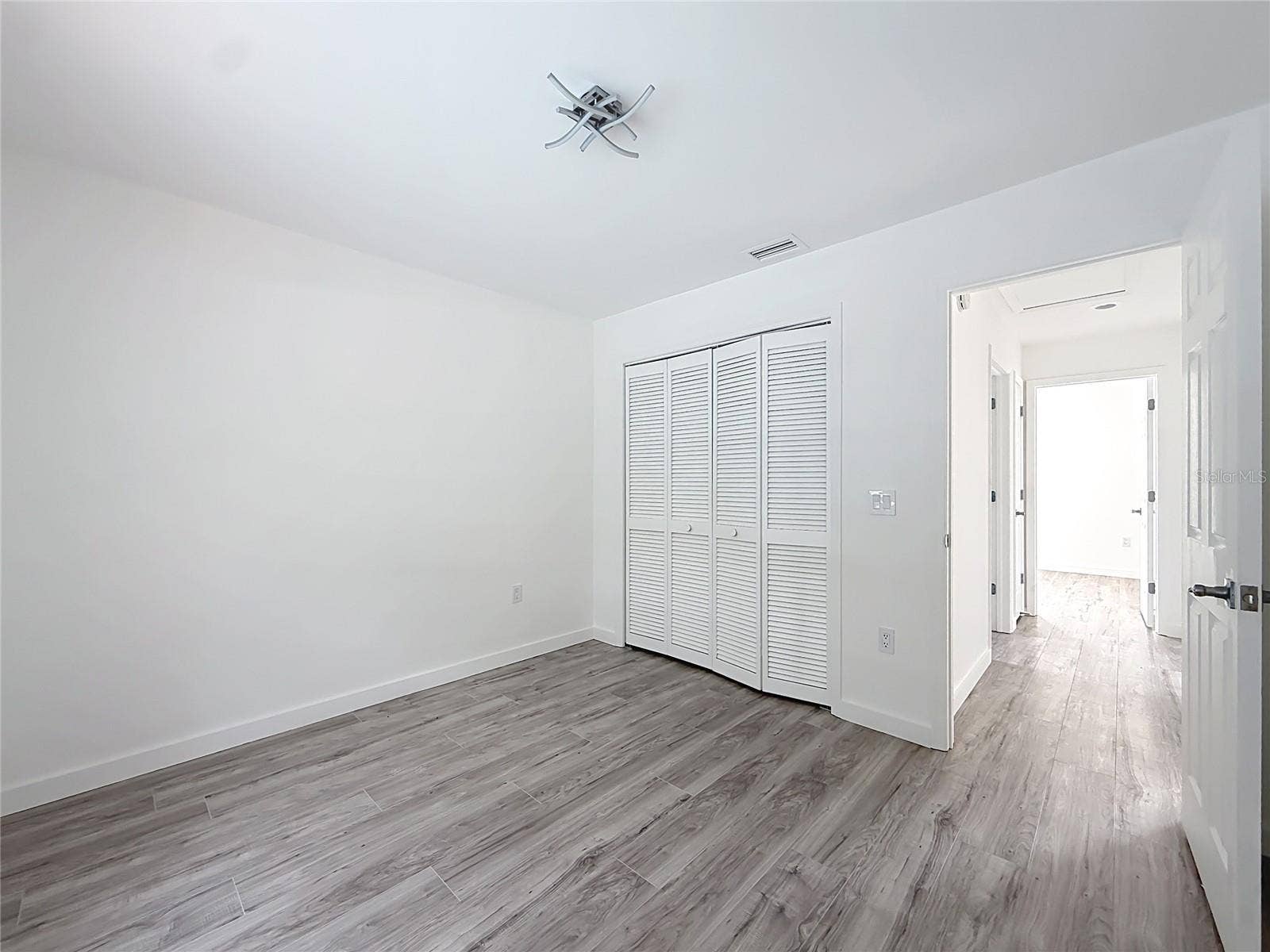 11 CARNATION COURT E, Homosassa, FL 34446 A flexible bedroom for guests or your daily retreat.
