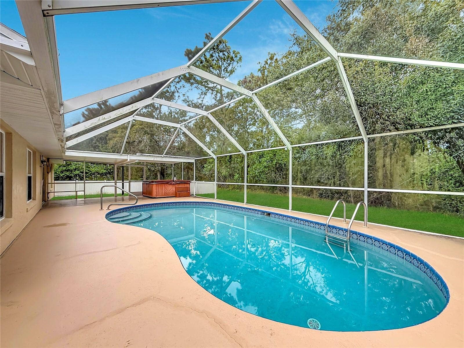 11 CARNATION COURT E, Homosassa, FL 34446 Your private pool brings vacation days home.