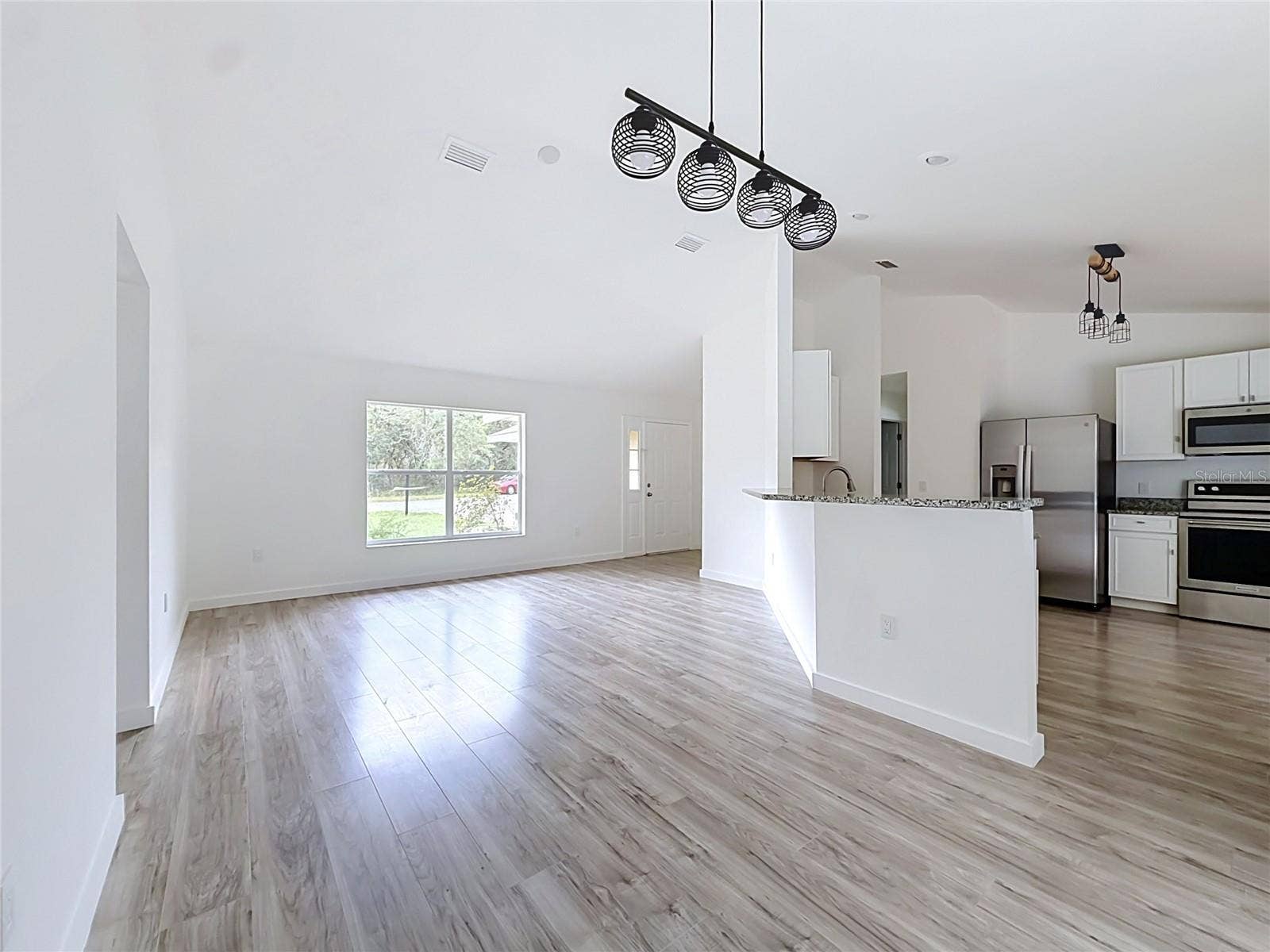 11 CARNATION COURT E, Homosassa, FL 34446 An open layout keeps guests and conversation connected.