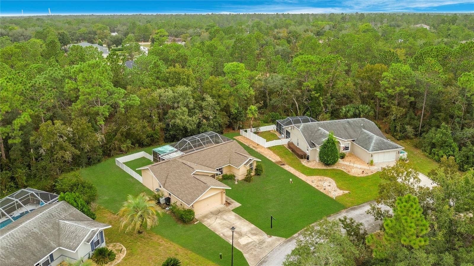 11 CARNATION COURT E, Homosassa, FL 34446 Your pool retreat amid a canopy of mature trees.