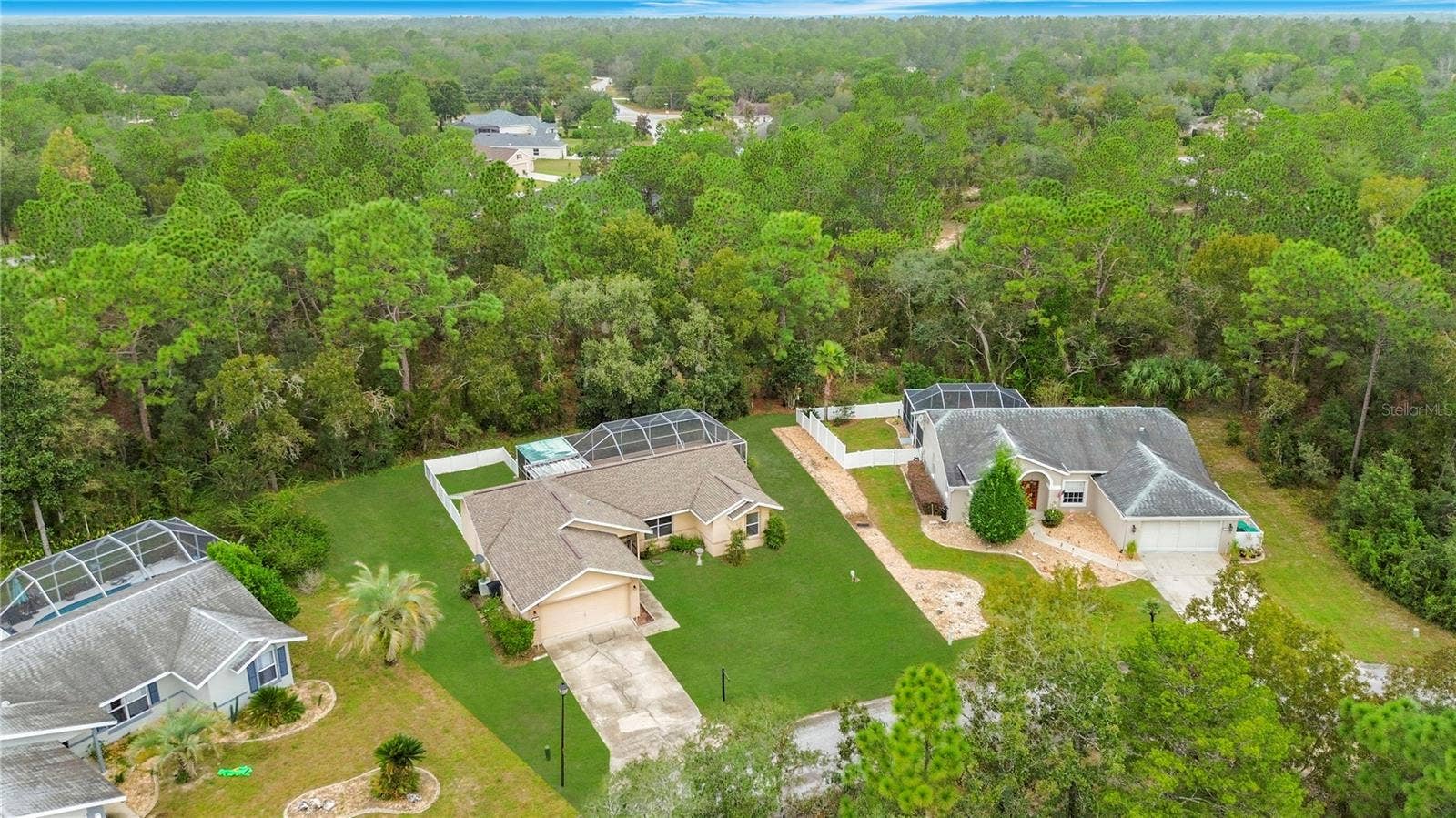 11 CARNATION COURT E, Homosassa, FL 34446 No rear neighbors and a lush wooded backdrop.