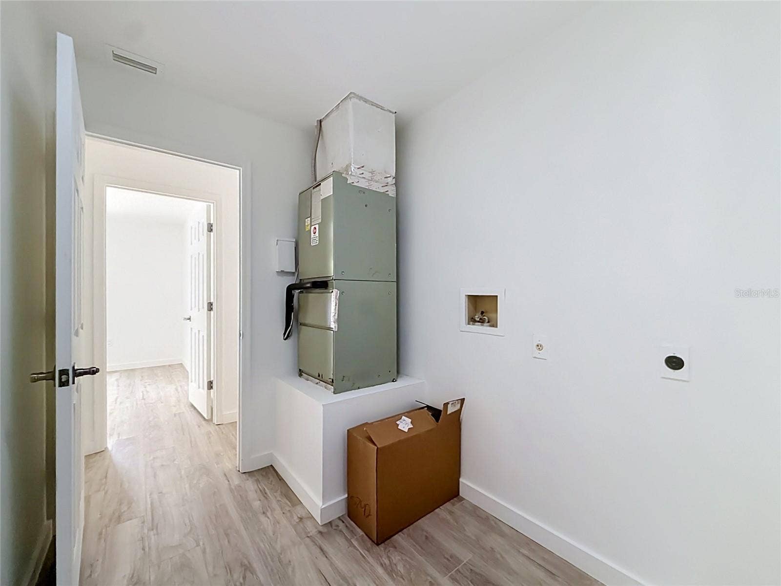 11 CARNATION COURT E, Homosassa, FL 34446 Indoor laundry keeps daily tasks out of the heat.