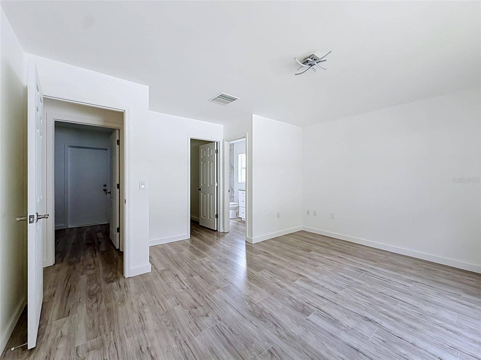 11 CARNATION COURT E, Homosassa, FL 34446 A spacious primary suite for restful evenings.