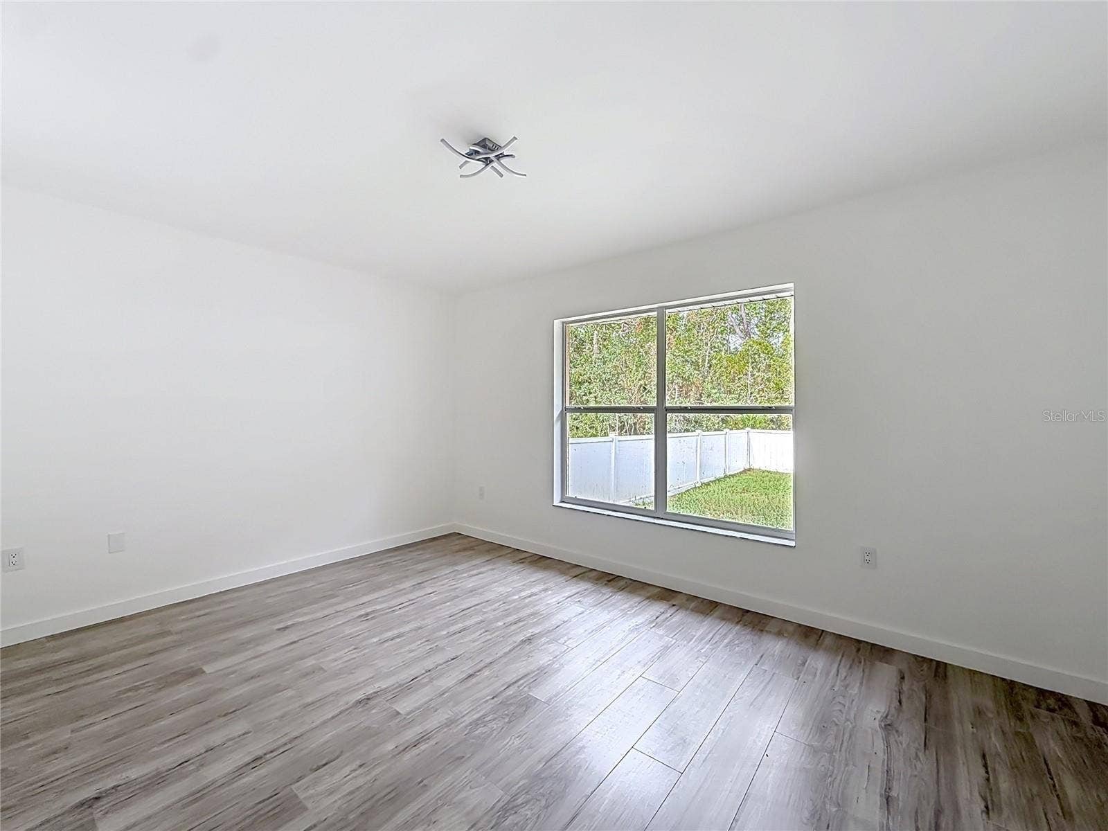 11 CARNATION COURT E, Homosassa, FL 34446 Natural light and room to create your own retreat.