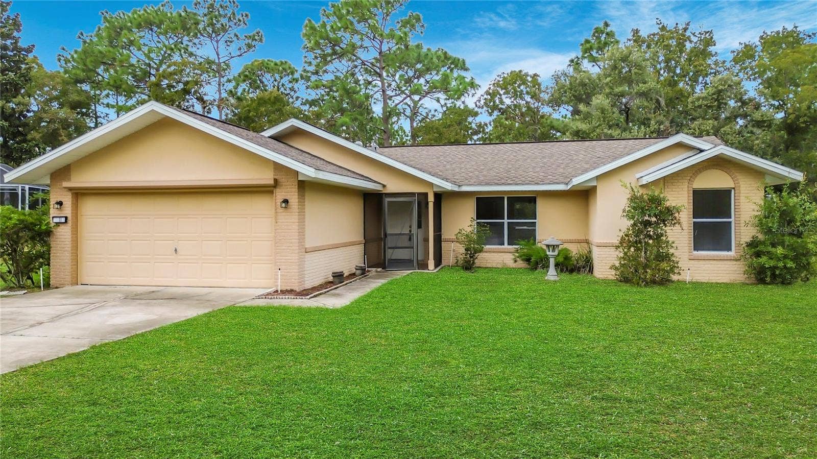11 CARNATION COURT E, Homosassa, FL 34446 Florida pool living starts here. Roof replaced in 2024.