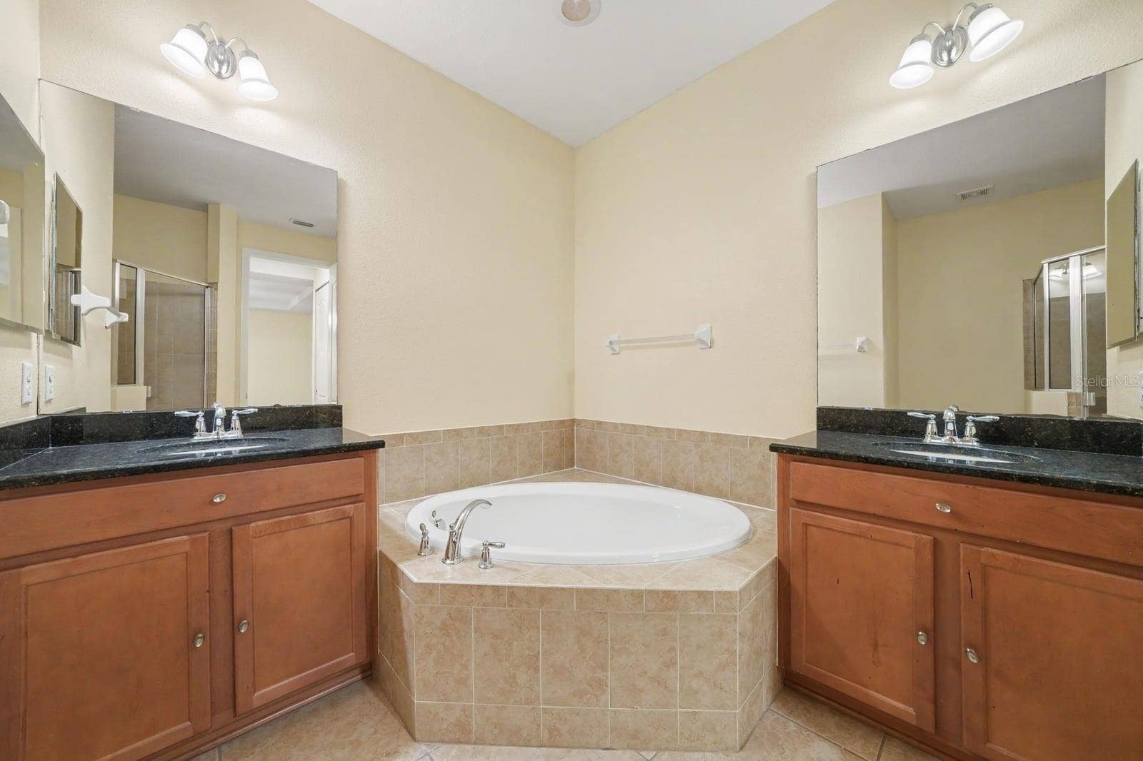 Luxurious Master Bath with Soaking Tub and Dual Vanities