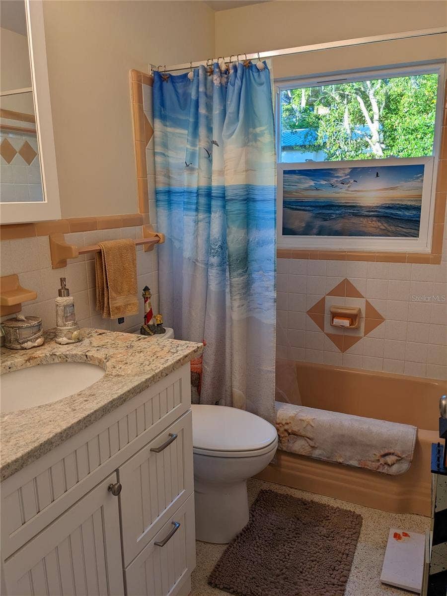 Guest bathroom with bathtub
