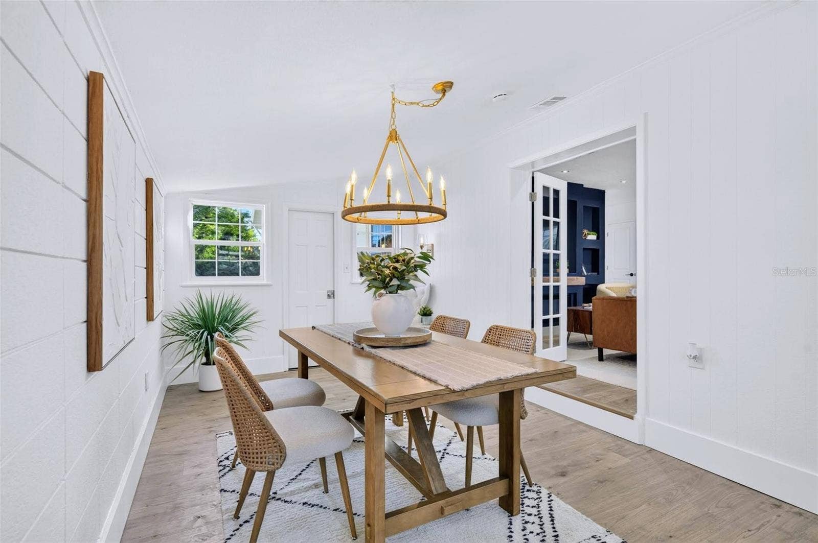2168 RIDGE DRIVE, Winter Park, FL 32792 Gorgeous chandelier with links and a hook, to be moveable depending on the size of the owners dining table.