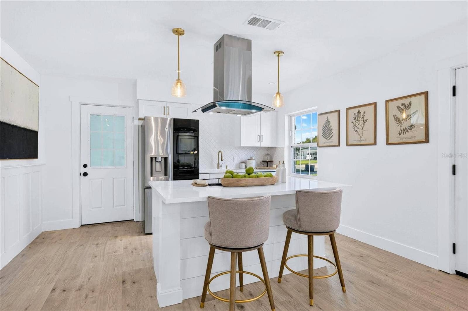 2168 RIDGE DRIVE, Winter Park, FL 32792 This kitchen island has electric in the island with custom shiplap backing.