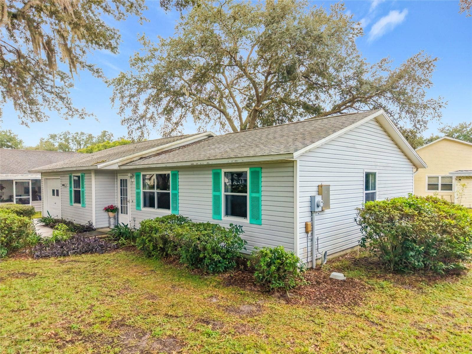 1038 SCOTCH PINE COURT, Leesburg, FL 34788 Side Home
