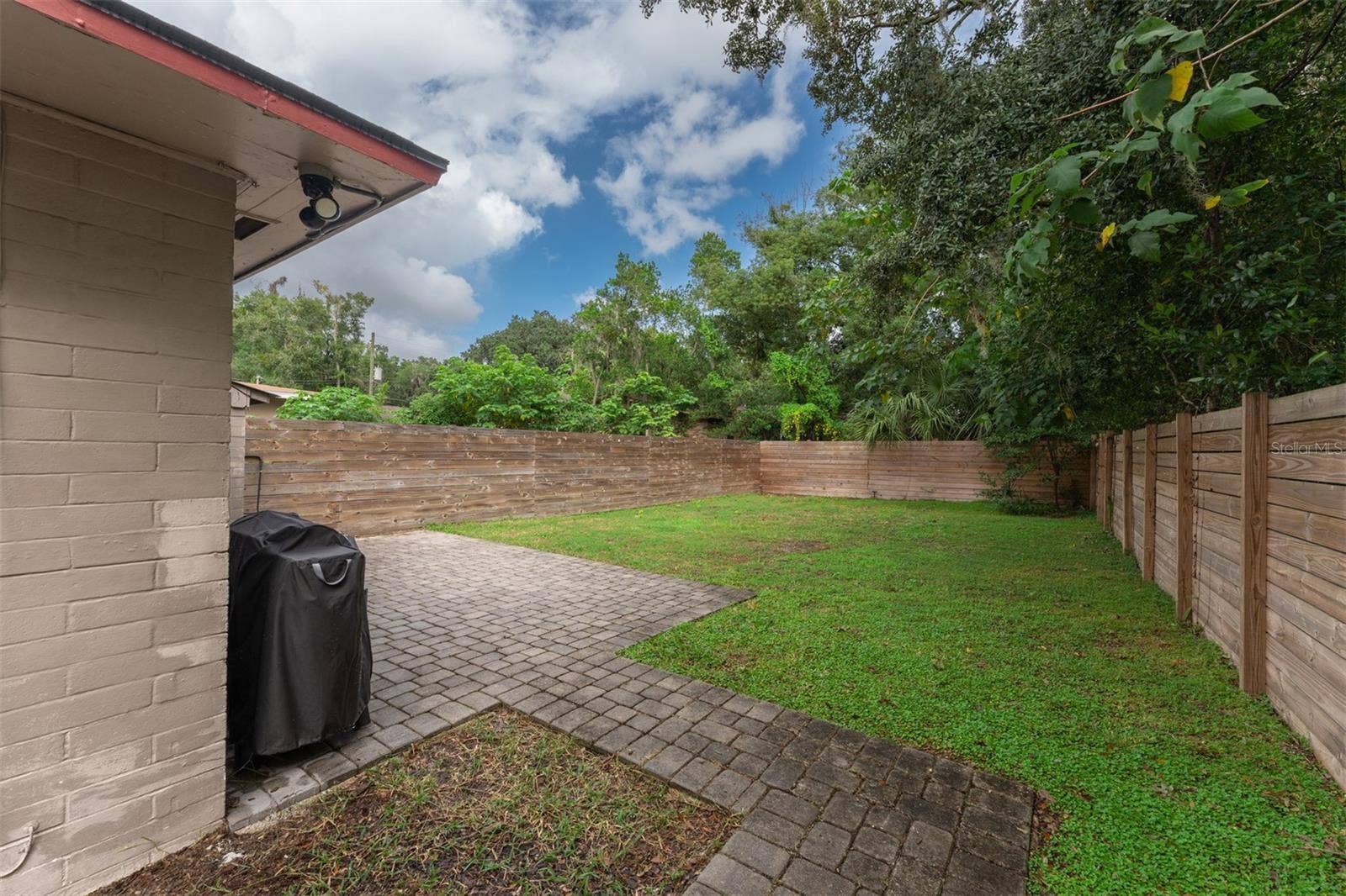 441 N FERN CREEK AVENUE, Orlando, FL 32803 Fenced back yard with patio