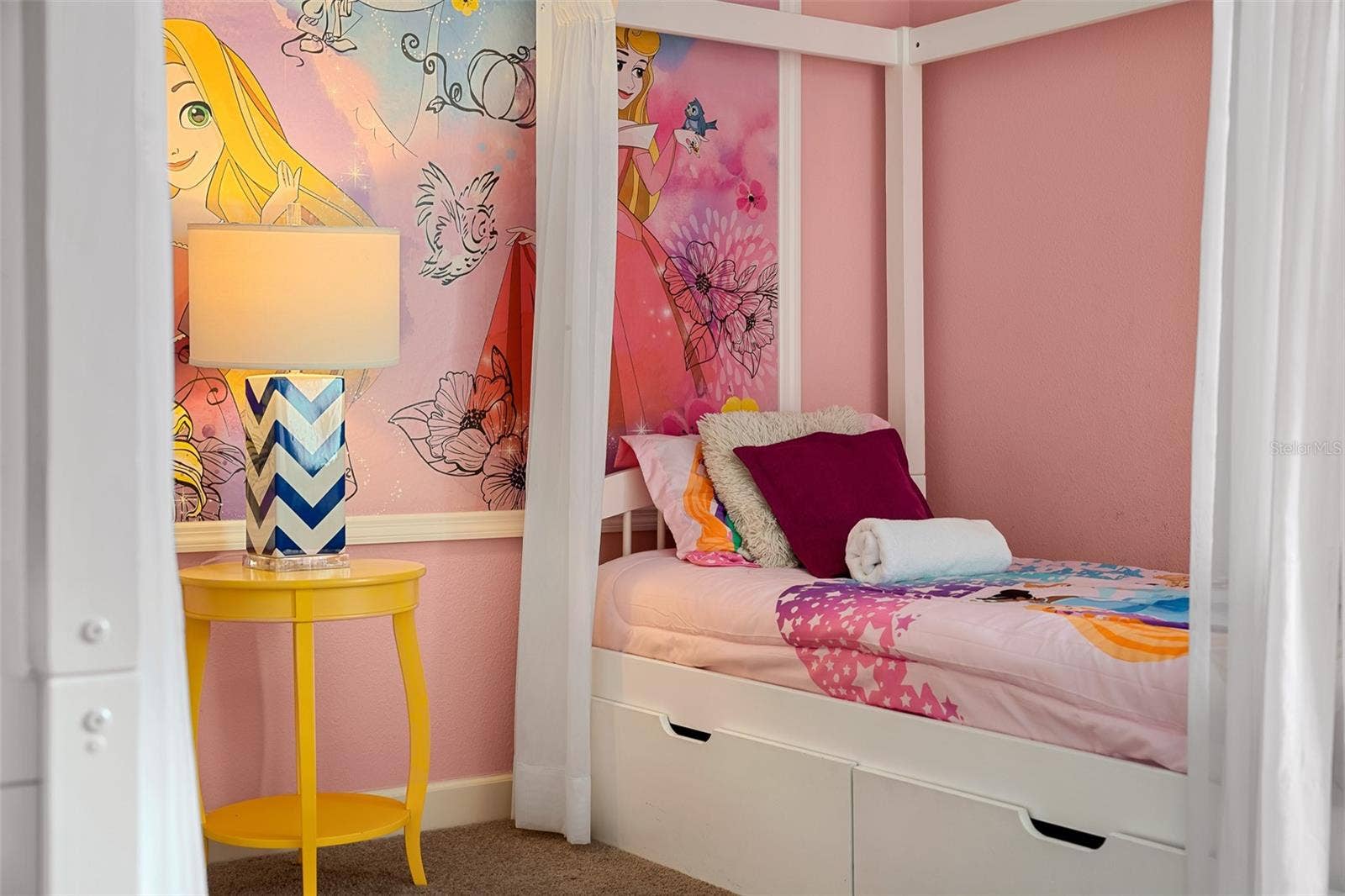 Sweet Princess-Themed Bedroom with Charming Canopy Beds and Playful Pink Details