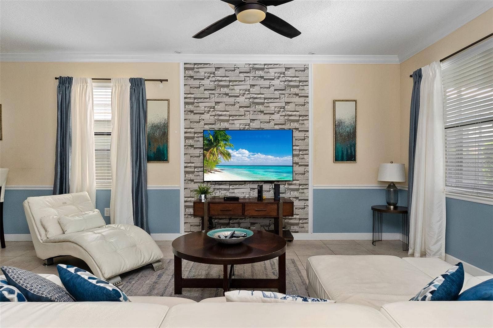 Bright, Inviting Living Room with Comfortable Seating and a Relaxed Coastal-Inspired Design