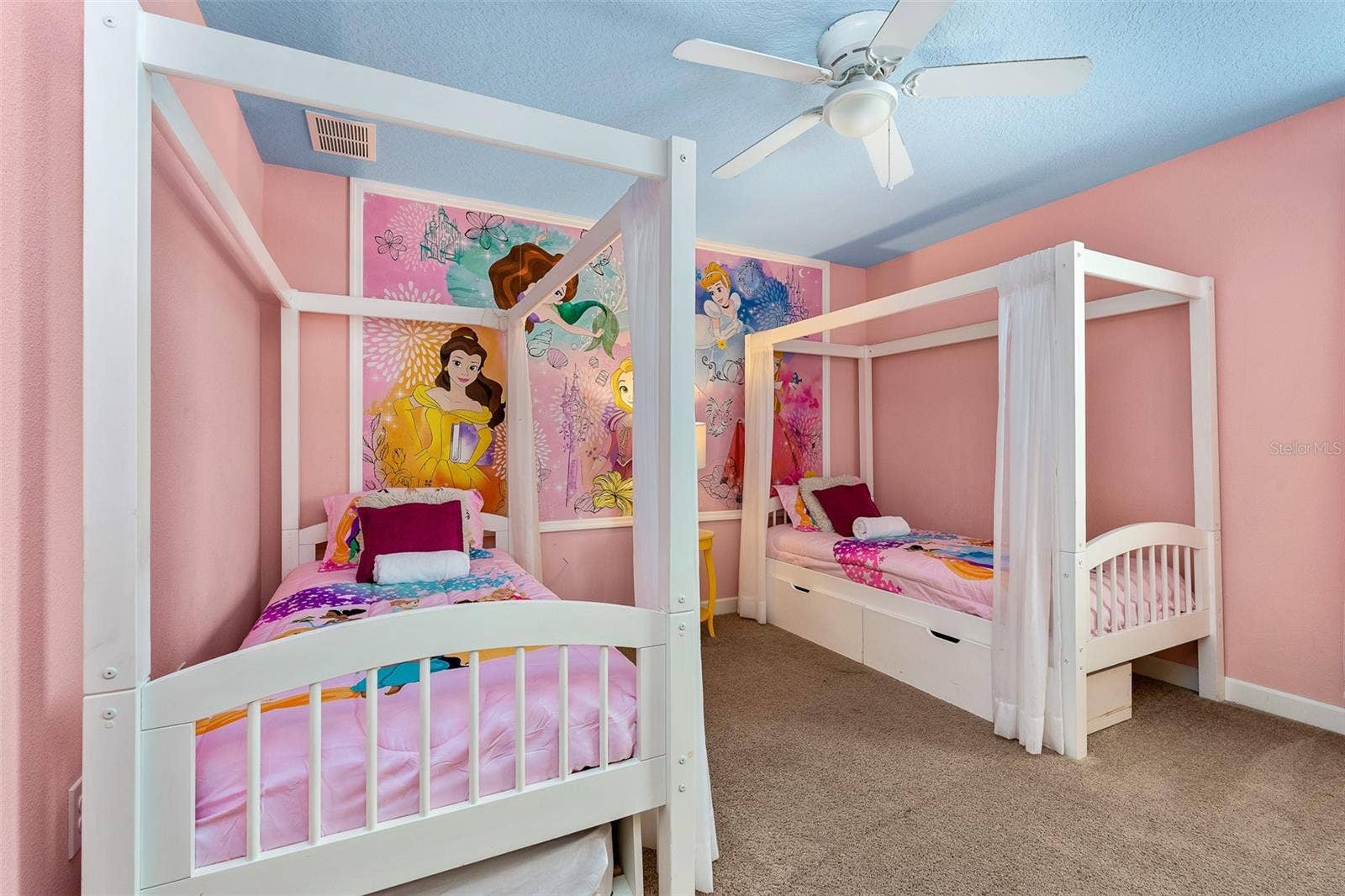 A Little Princess Magic! Charming Themed Bedroom with Twin Canopy Beds and Pretty Pink Accents