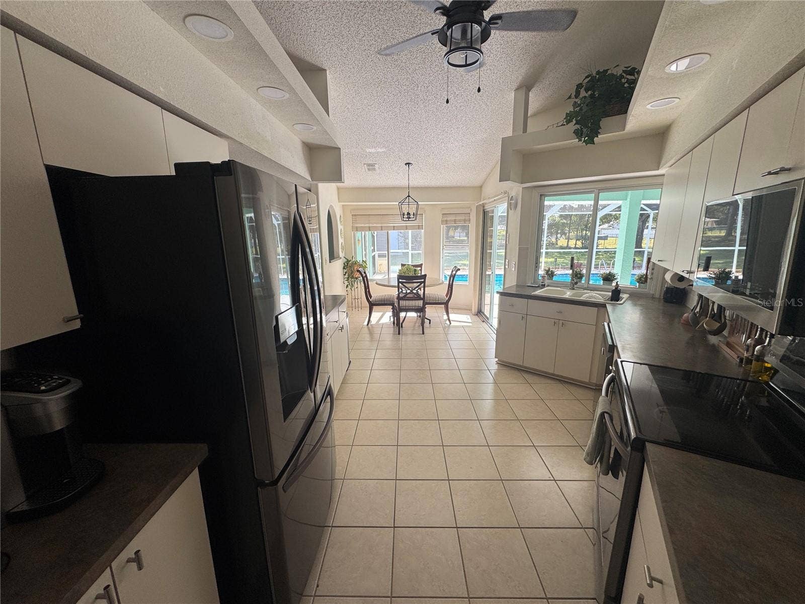 6104 W WAYWARD WIND LOOP, Homosassa, FL 34448 Kitchen to Dining Room