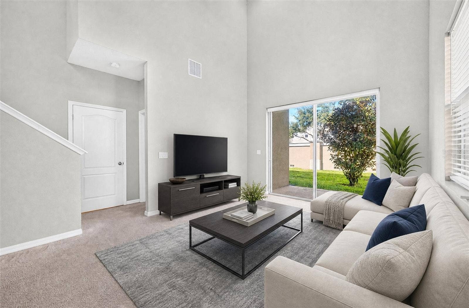 2128 LENNOX DALE LANE, Brandon, FL 33510 Bright and welcoming, the Living Room provides a comfortable gathering space with an open, airy feel. Virtually Staged