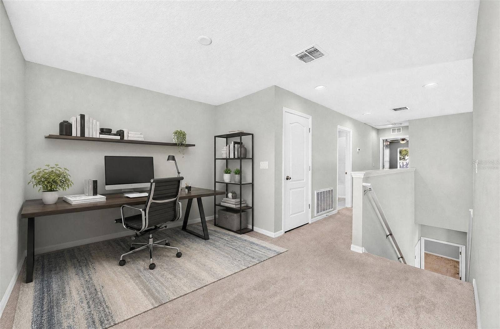 2128 LENNOX DALE LANE, Brandon, FL 33510 Upstairs, a VERSATILE LOFT provides additional living space that can easily accommodate a home office, reading area, media space or playroom. Virtually Staged