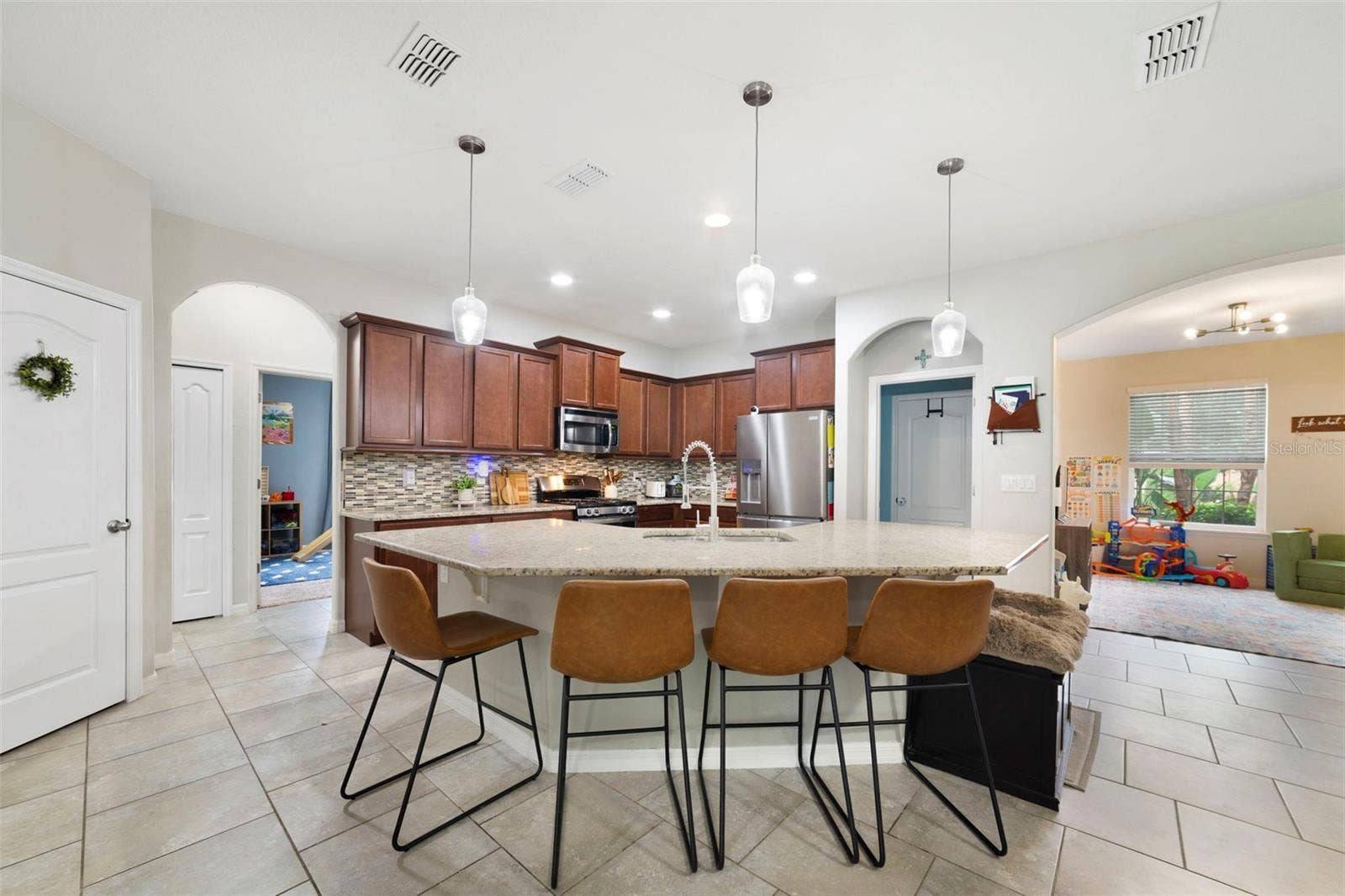 611 MEADOW SAGE DRIVE, Deland, FL 32724 Kitchen is open to the living and dining areas.
