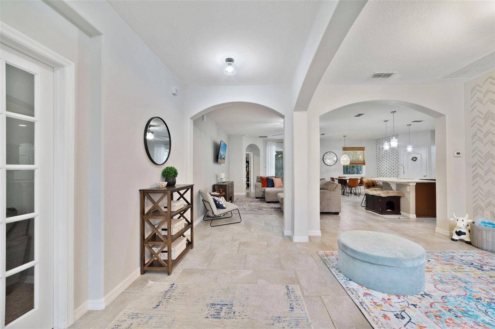 611 MEADOW SAGE DRIVE, Deland, FL 32724 Foyer flows into the open concept living and dining spaces.