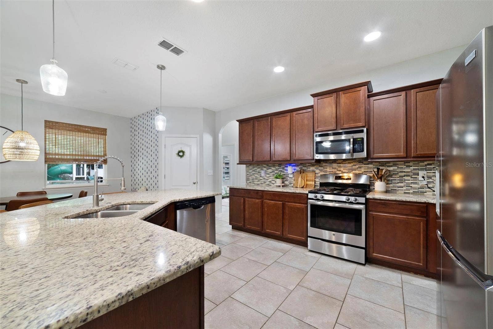 611 MEADOW SAGE DRIVE, Deland, FL 32724 Gas range, ample storage.