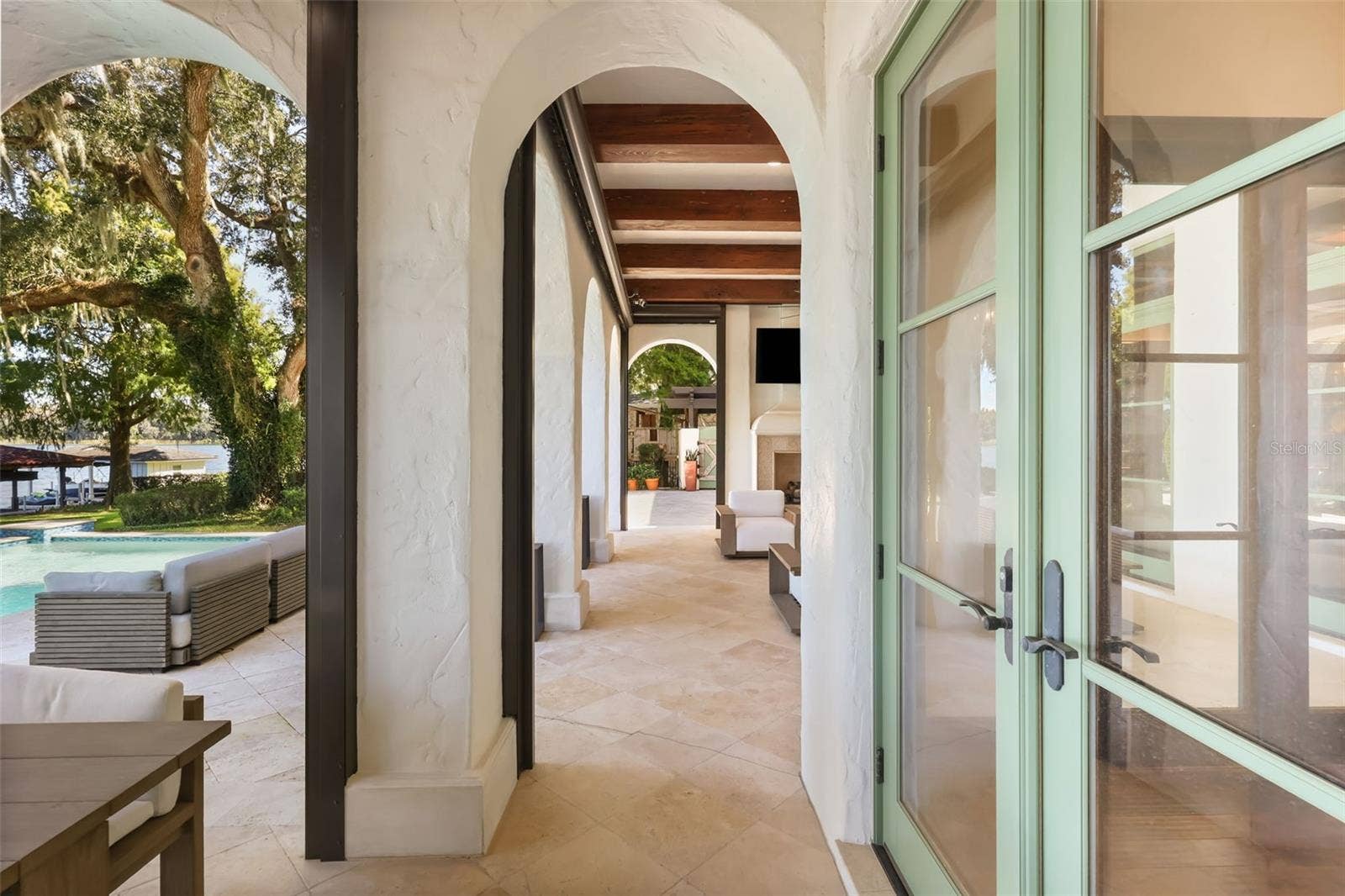 541 VIRGINIA DRIVE, Winter Park, FL 32789 Covered lanai with retractable screens
