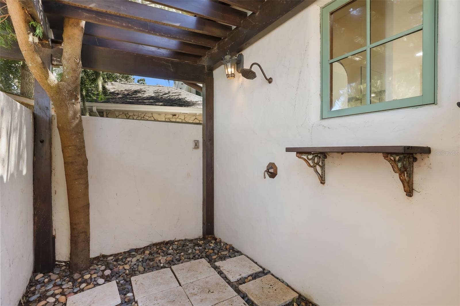 541 VIRGINIA DRIVE, Winter Park, FL 32789 Outdoor shower outside of primary bathroom