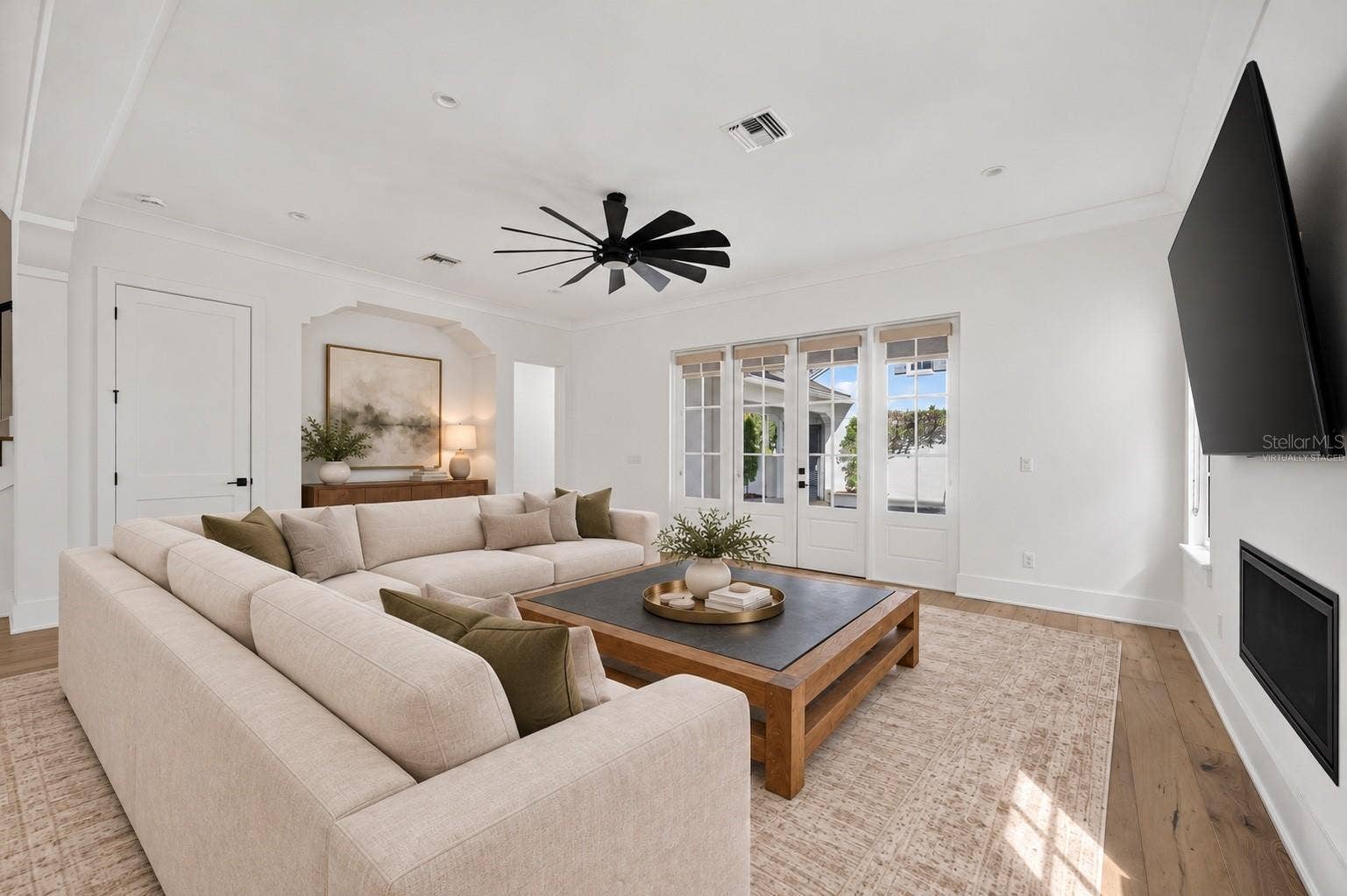 1900 SUNSET DRIVE, Winter Park, FL 32789 Living room overlooking the courtyardVirtually Staged