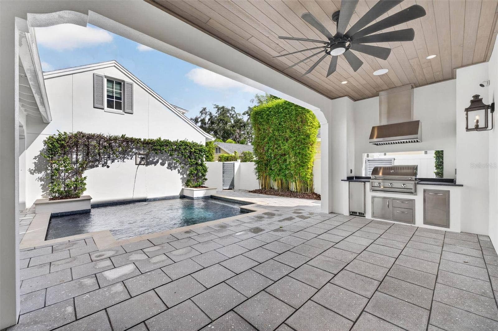 1900 SUNSET DRIVE, Winter Park, FL 32789 Covered patio with outdoor kitchen