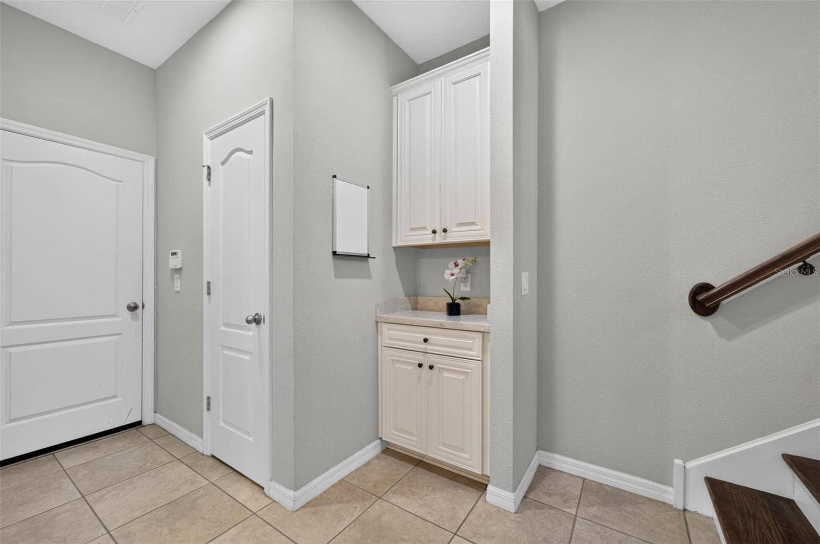 716 GRADO POINT, Oviedo, FL 32765 Drop zone on the first floor, by closet and garage entry door.