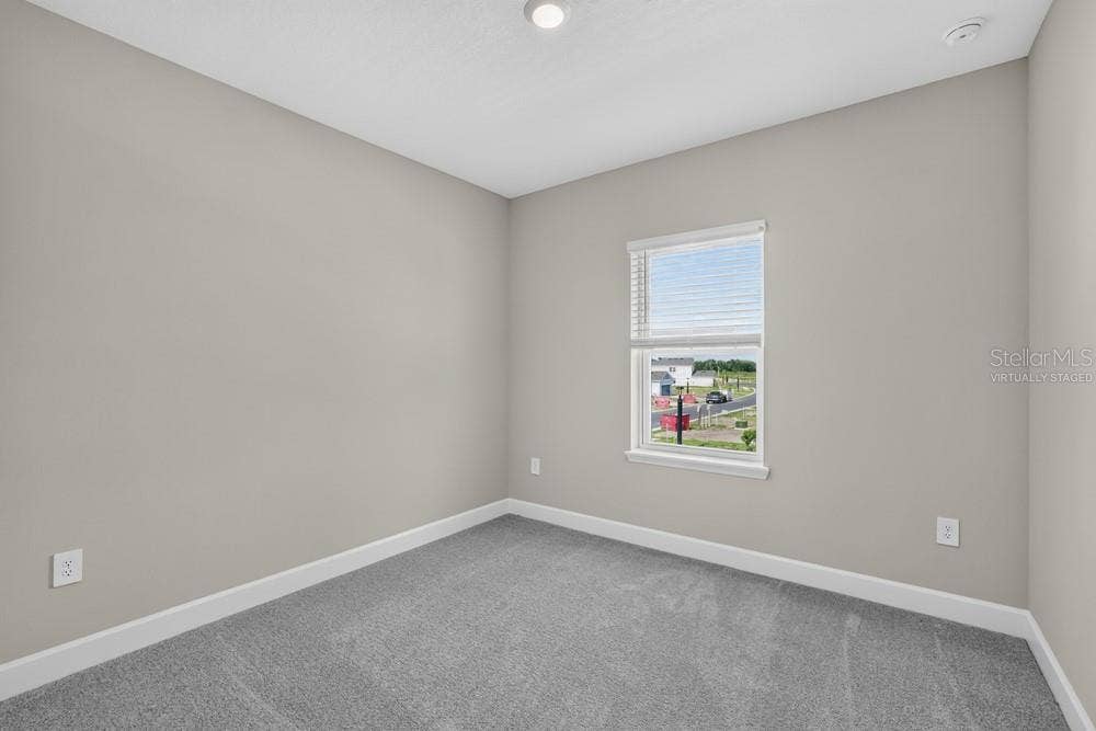 5691 SEAGRAPE LANE, Kissimmee, FL 34758 Virtually staged photos are for representative purposes only.