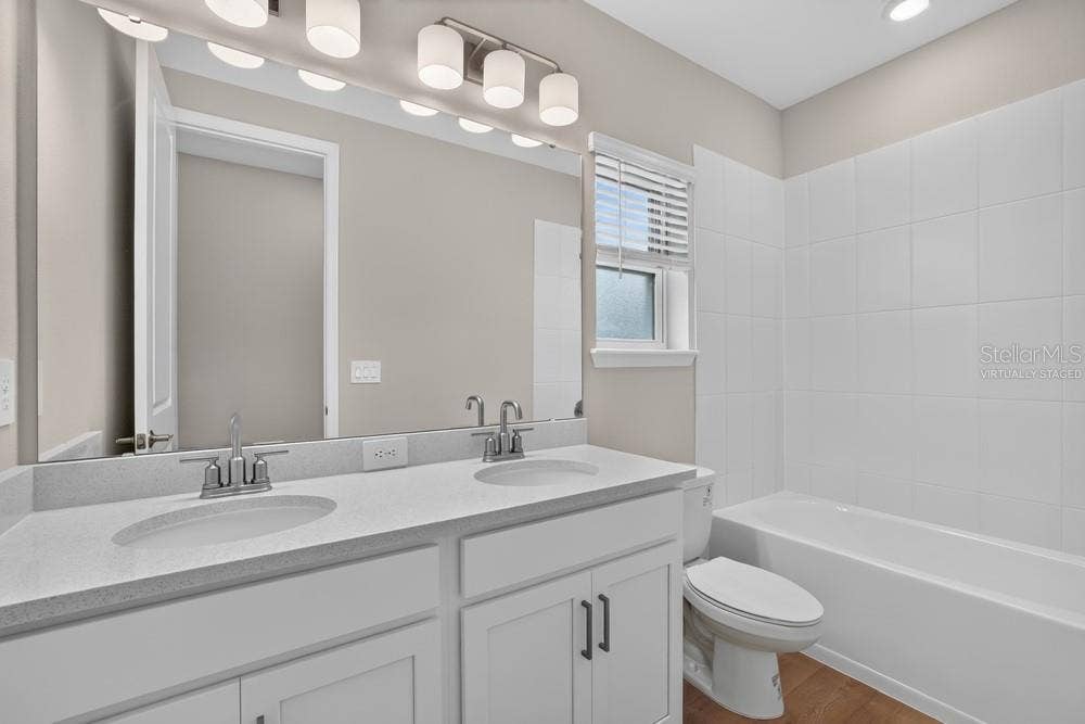 5691 SEAGRAPE LANE, Kissimmee, FL 34758 Virtually staged photos are for representative purposes only.