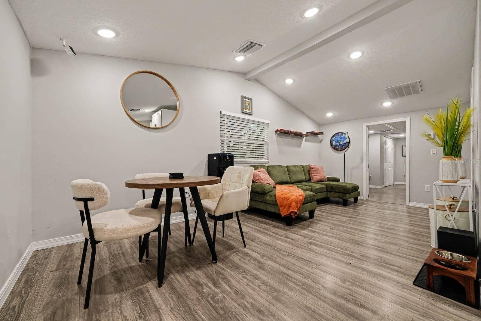 1611 SALMON STREET, St Cloud, FL 34771 Spacious great room offering dining and lounge areas with modern finishes