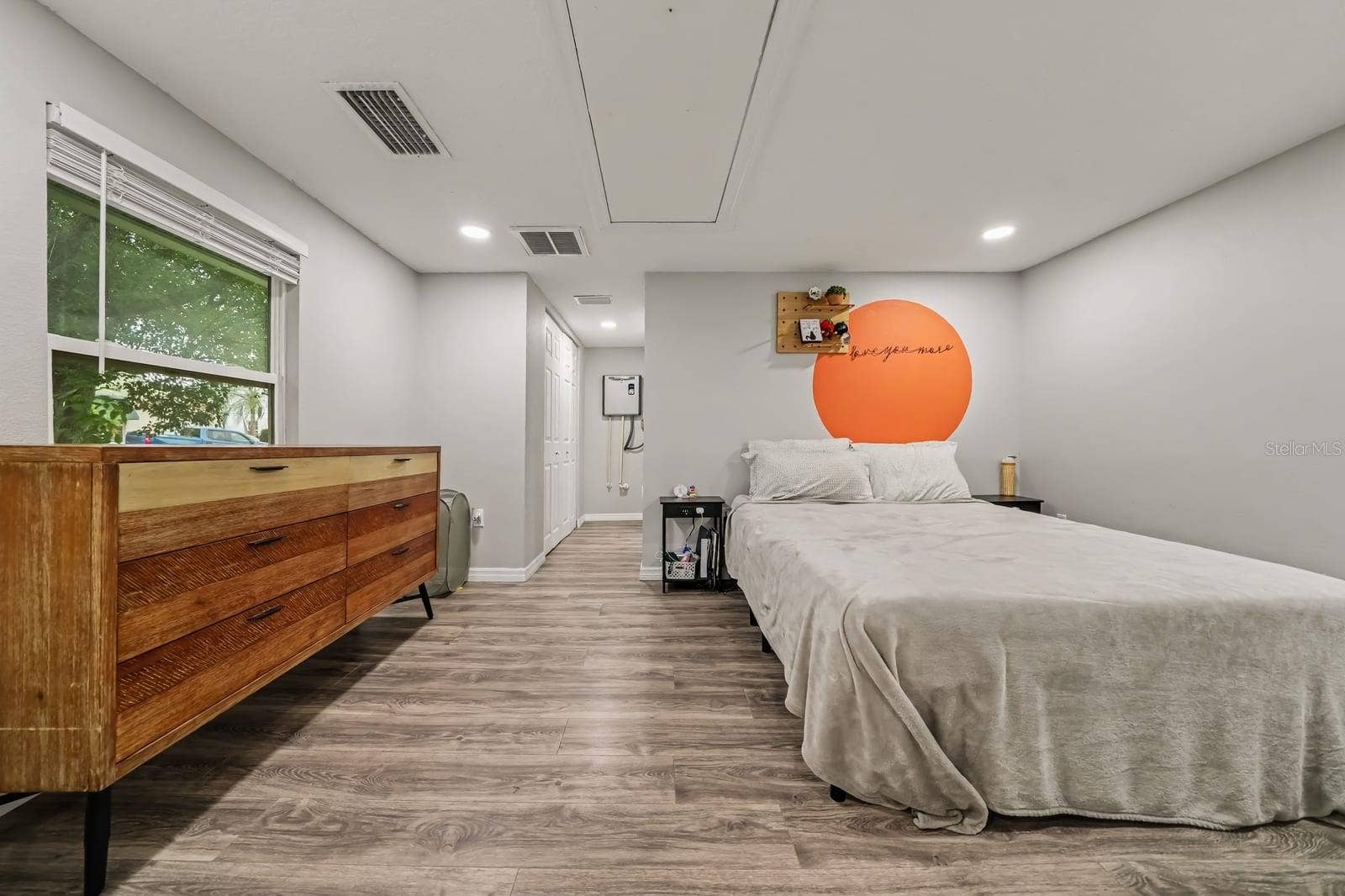 1611 SALMON STREET, St Cloud, FL 34771 Spacious Primary Bedroom with Natural Light and Hardwood Flooring