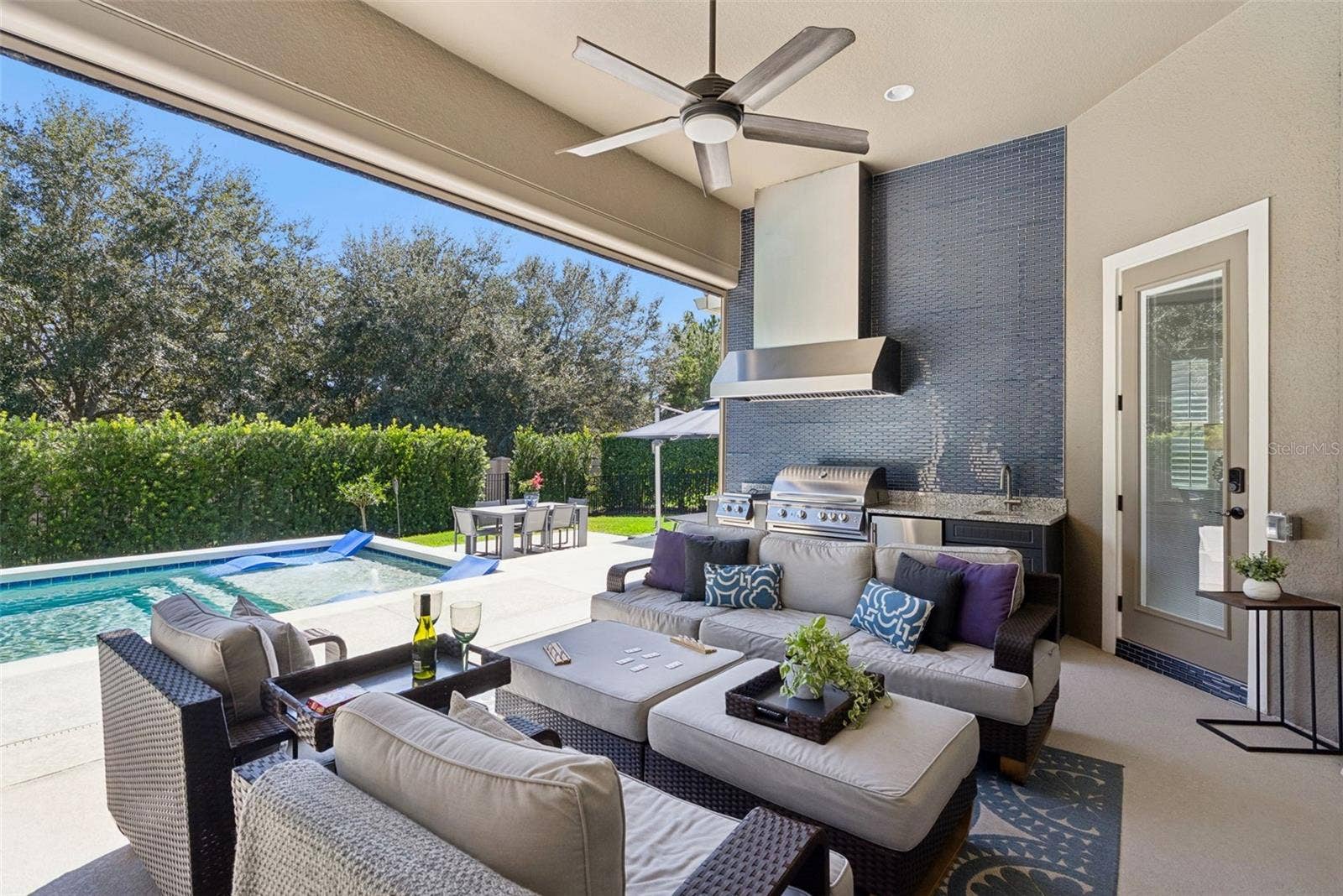 Covered lanai with remote operated screen enclosure