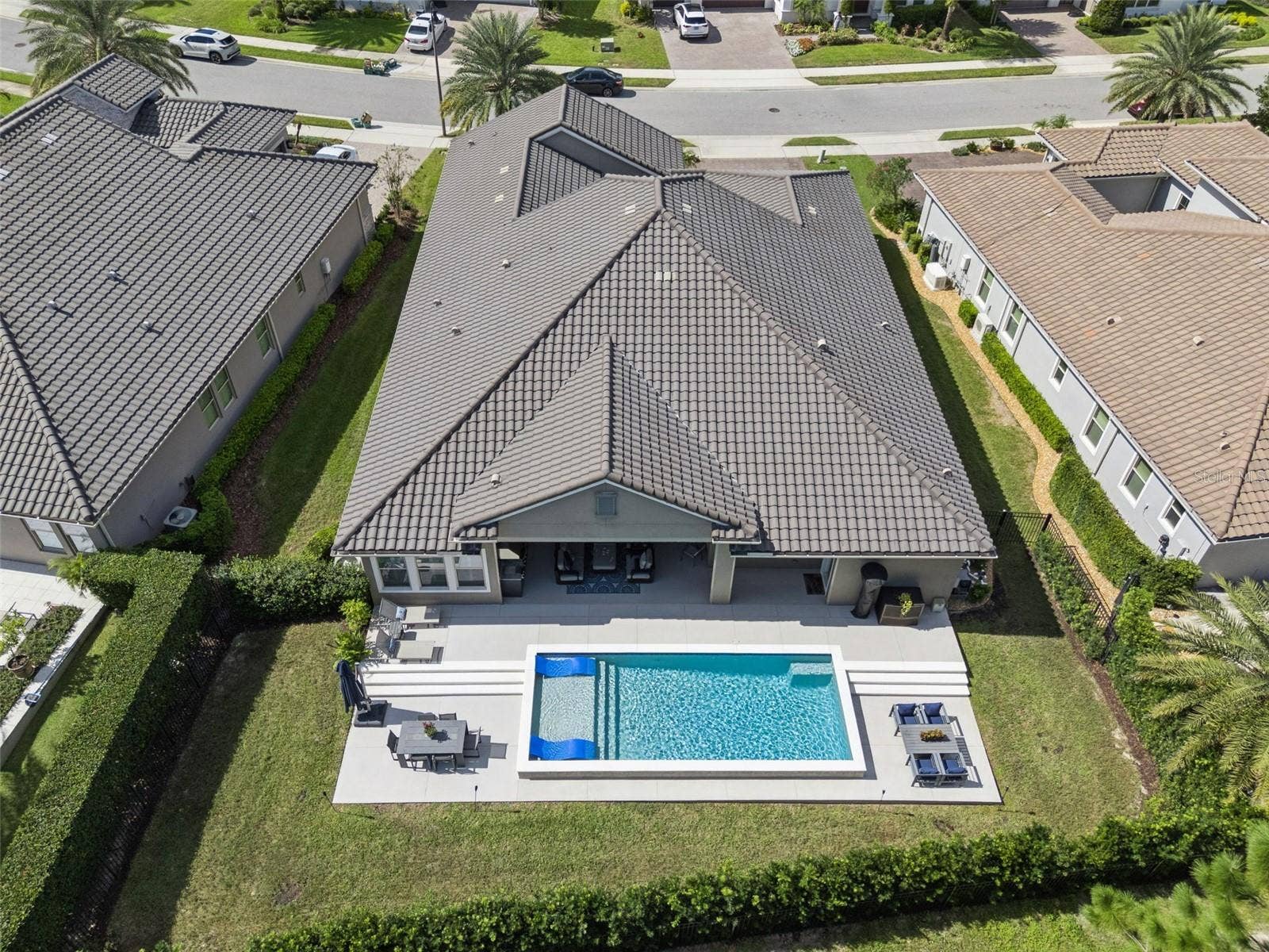 Fully-fenced, resort-style backyard oasis to enjoy the best of Florida living