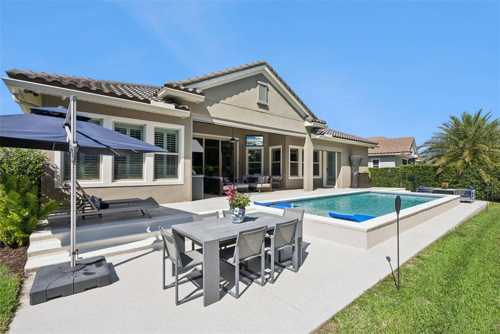 Resort-style backyard oasis to enjoy the best of Florida living