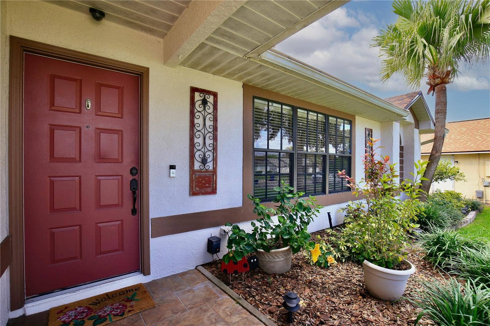 6833 WOODGRAIN COURT, Ocoee, FL 34761 Covered front porch