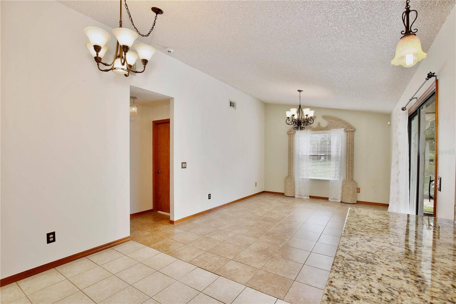 6833 WOODGRAIN COURT, Ocoee, FL 34761 Dinette and Family Room