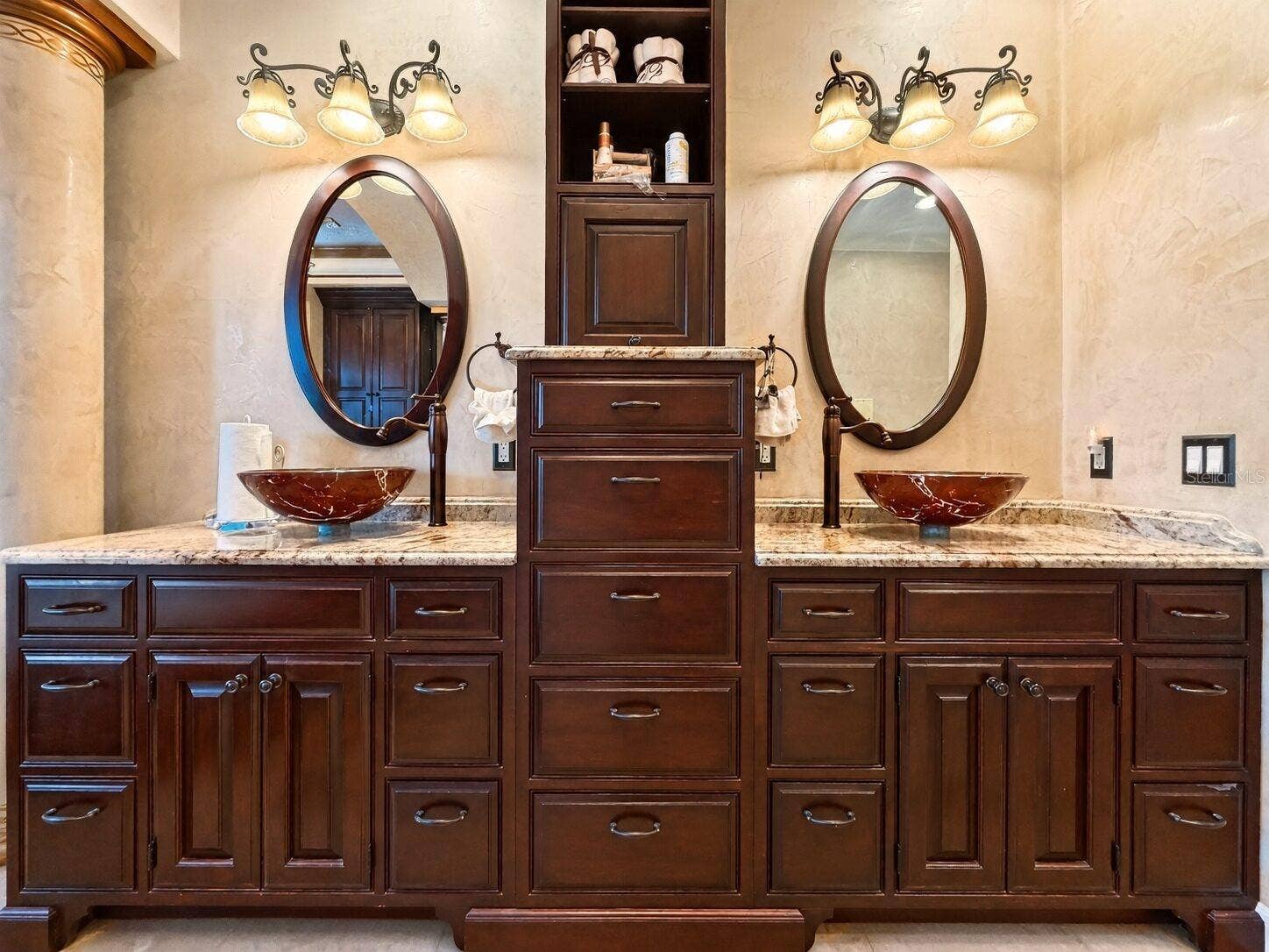 Jetted tub and chandeliers