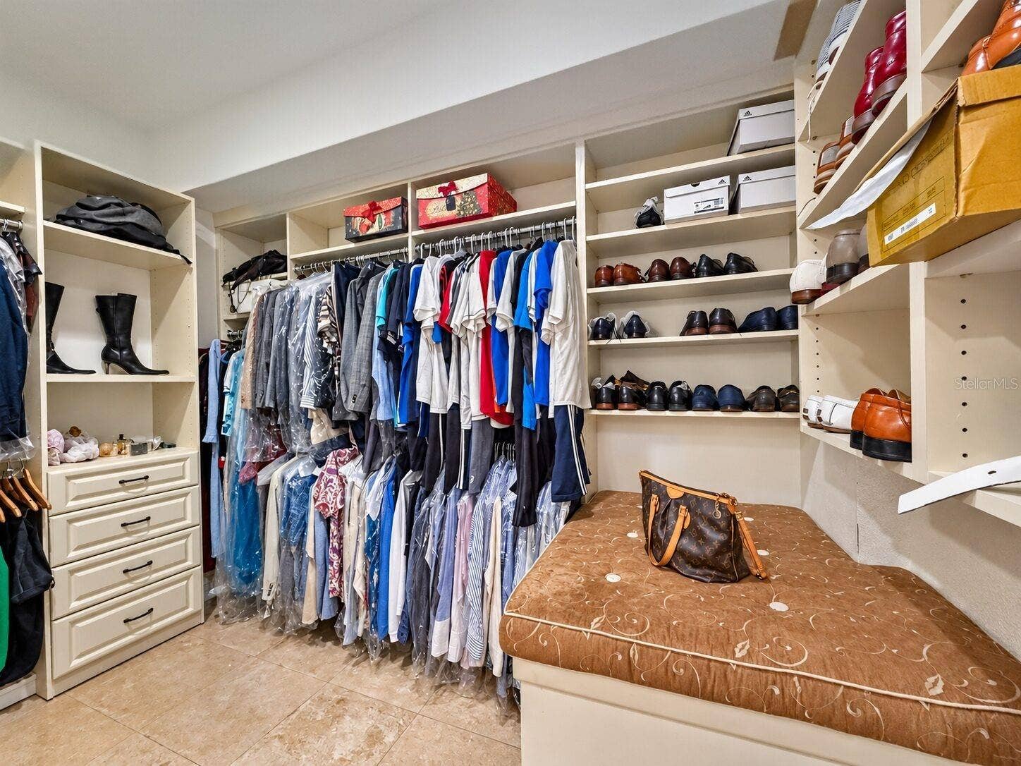 Custom walk-in closet with in-floor safe
