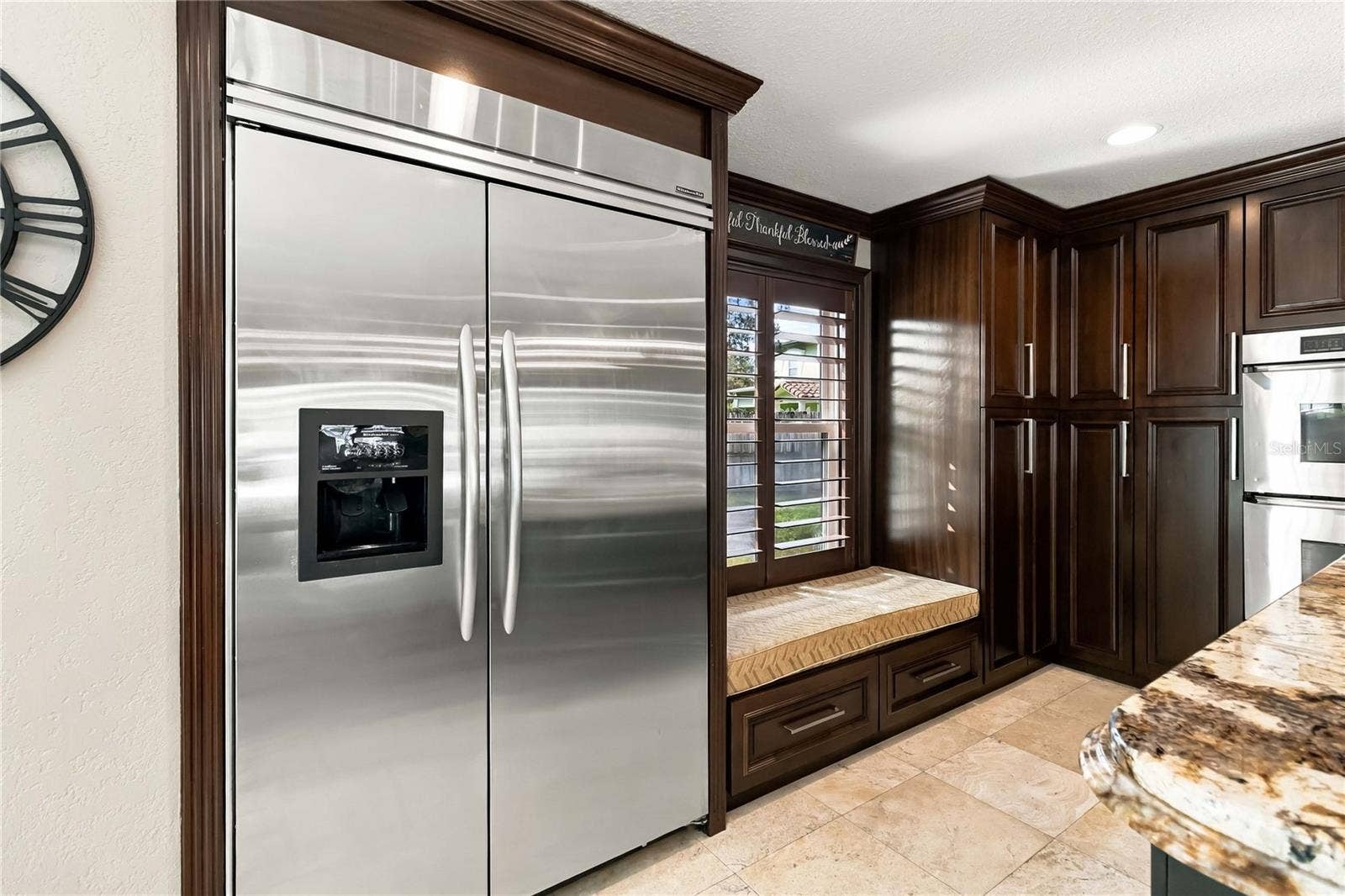 111 PINE TREE LANE, Altamonte Springs, FL 32714 KitchenAid professional-grade, built-in refrigerator with a luxury Sub-Zero-style finish.