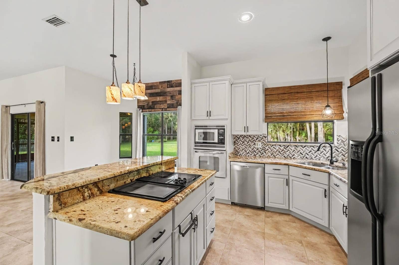 5560 BOB WHITE TRAIL, Mims, FL 32754 Gourmet Kitchen With Dual Islands, Granite Counters & Abundant Natural Light