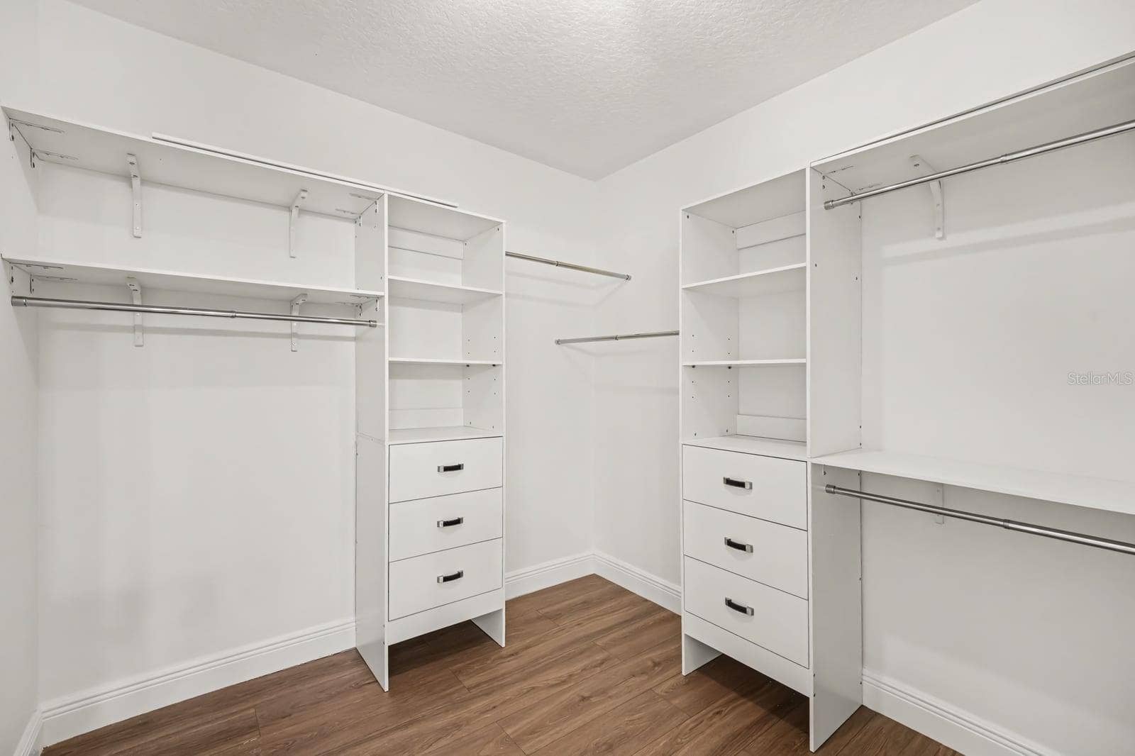 5560 BOB WHITE TRAIL, Mims, FL 32754 Walk-In Closet with Dual Clothing Rods, Shelving, and Drawer Storage