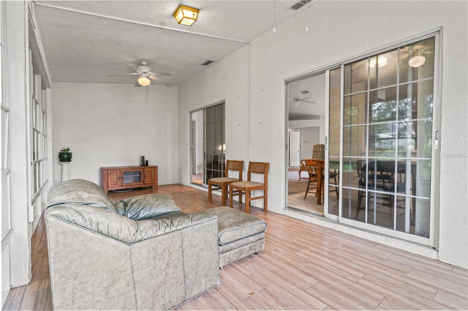 7734 SW 114TH LOOP, Ocala, FL 34476 Covered Porch with Tile & AC