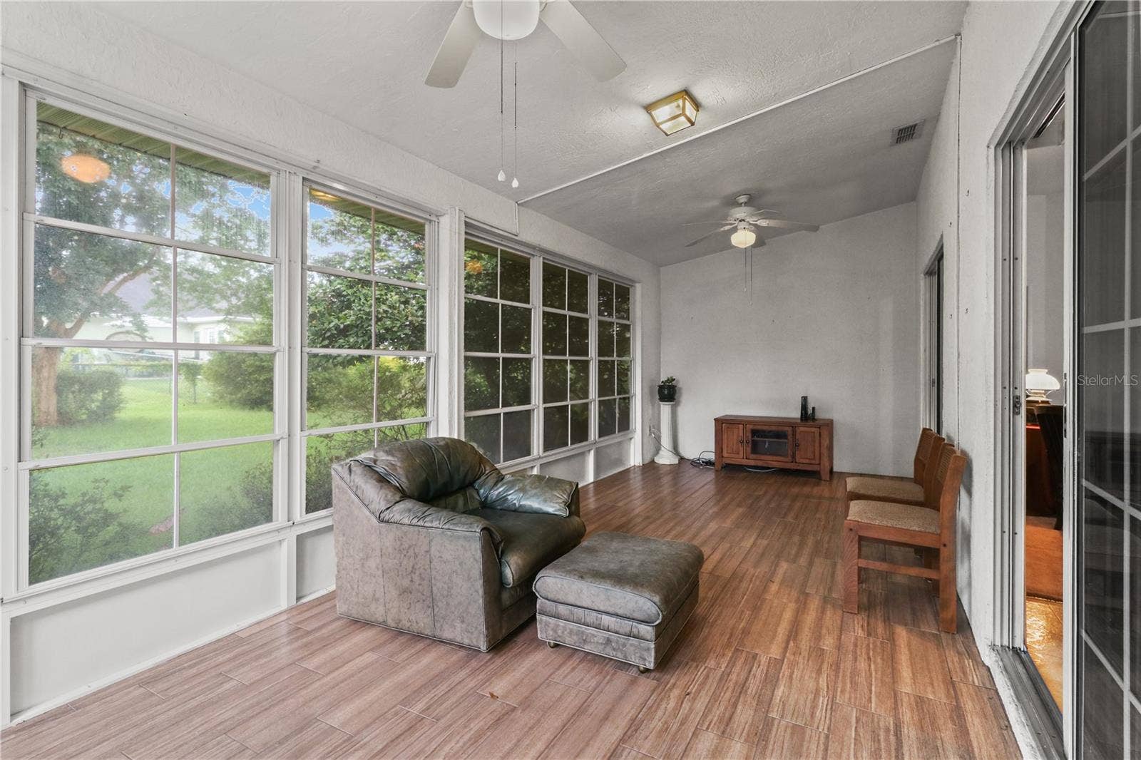 7734 SW 114TH LOOP, Ocala, FL 34476 Covered Porch with Tile & AC