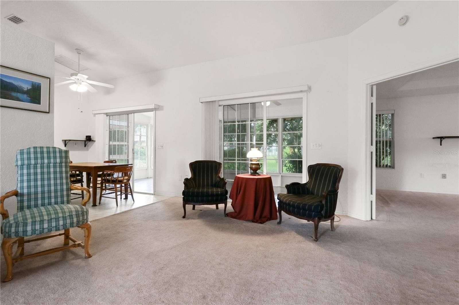 7734 SW 114TH LOOP, Ocala, FL 34476 Living Room & Entry to Primary