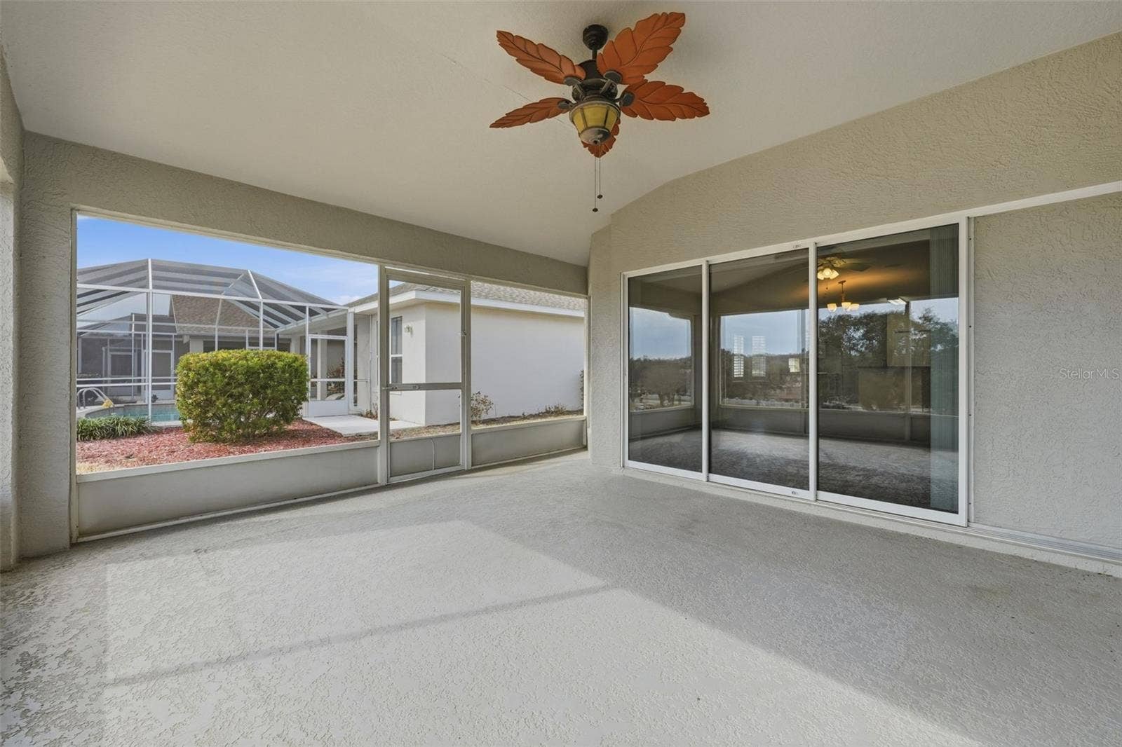 2311 N ANDREA POINT, Lecanto, FL 34461 Lanai with triple pocket sliders to great room and living space!