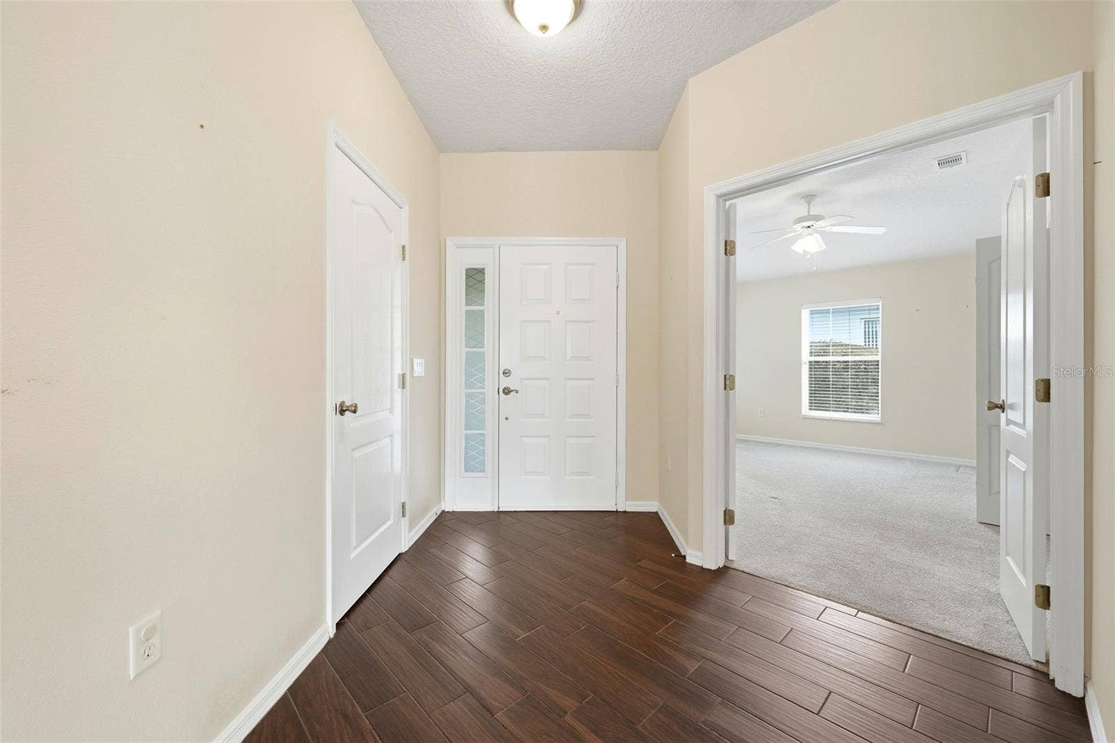 2311 N ANDREA POINT, Lecanto, FL 34461 Inside entrance with coat closet and double doors to office/den or third bedroom
